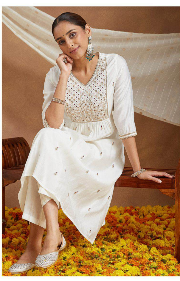 Ivory Grace Embroidered Peplum Set